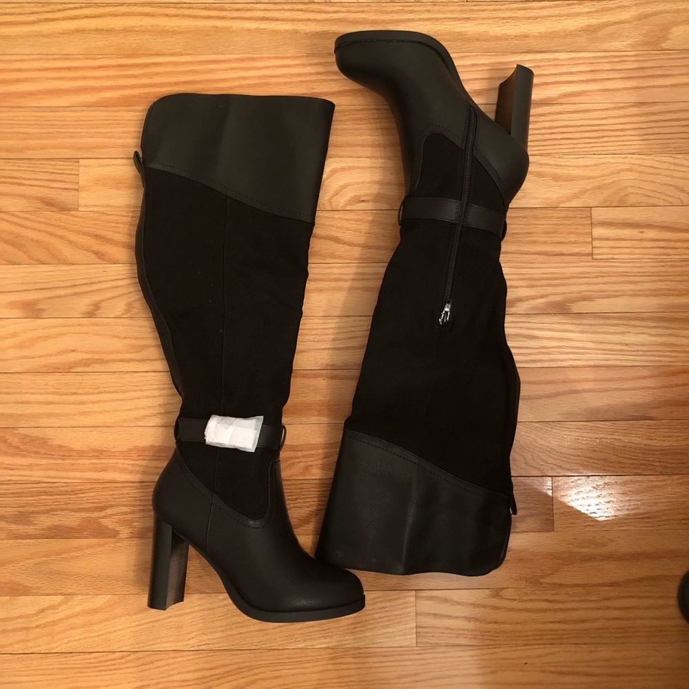 Heeled tall boot
